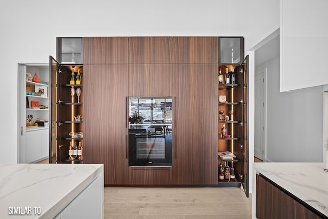 1167 S Wilder Pl, West Des Moines, IA 50266 - wine area featuring light wood finished floors