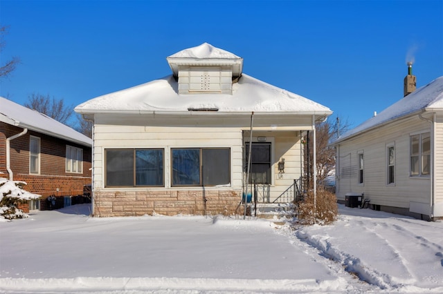 view of snow covered property