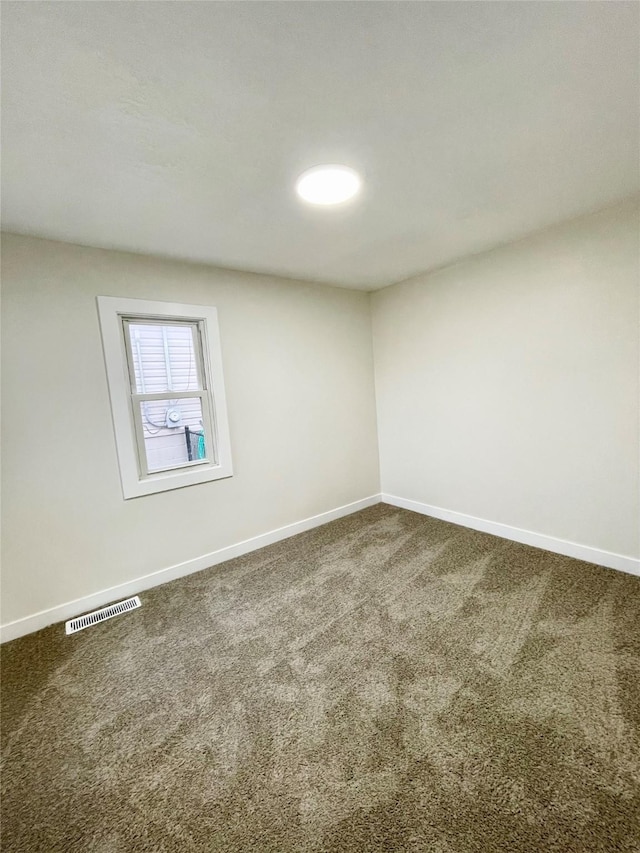 view of carpeted spare room