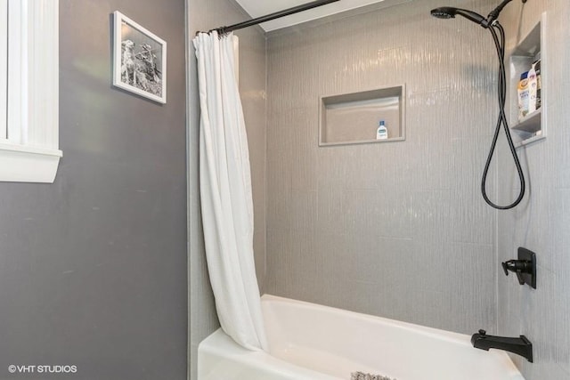 full bathroom with shower / bathtub combination with curtain