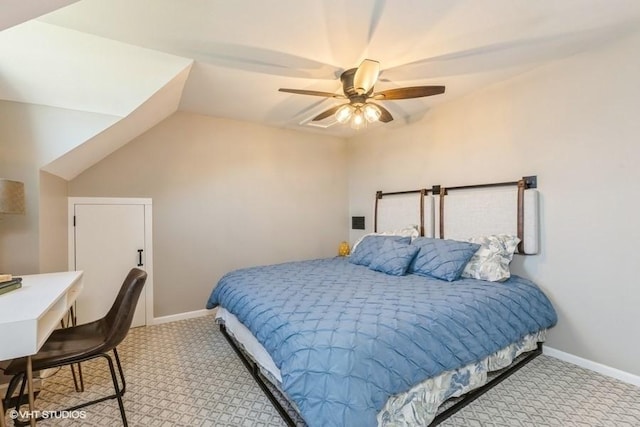 bedroom with ceiling fan, carpet floors, lofted ceiling, and baseboards