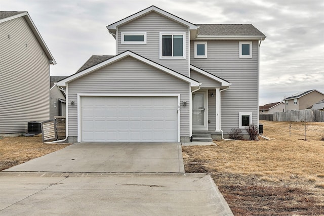 view of front of home with a garage