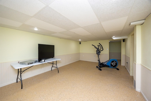 2711 Westover Blvd, Des Moines, IA 50322 - workout room featuring a drop ceiling and wainscoting