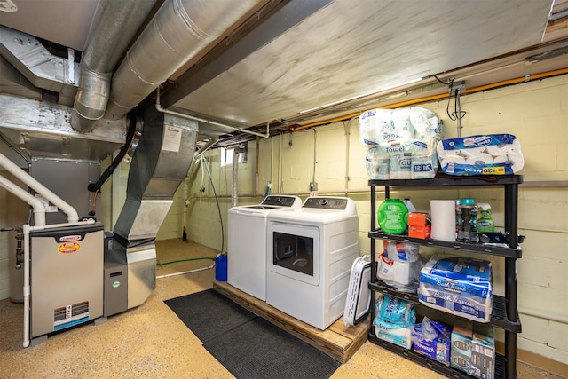 2711 Westover Blvd, Des Moines, IA 50322 - unfinished basement with washing machine and dryer and concrete block wall