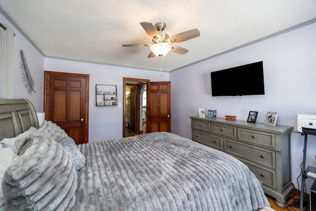2711 Westover Blvd, Des Moines, IA 50322 - bedroom with a textured ceiling and ceiling fan