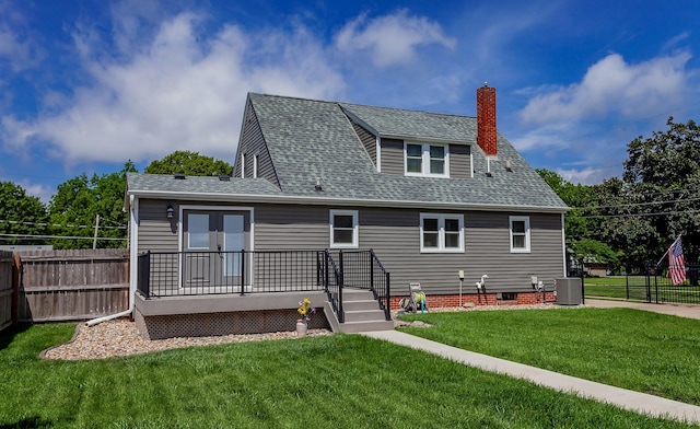 2711 Westover Blvd, Des Moines, IA 50322 - back of house featuring a wooden deck, a shingled roof, and a chimney