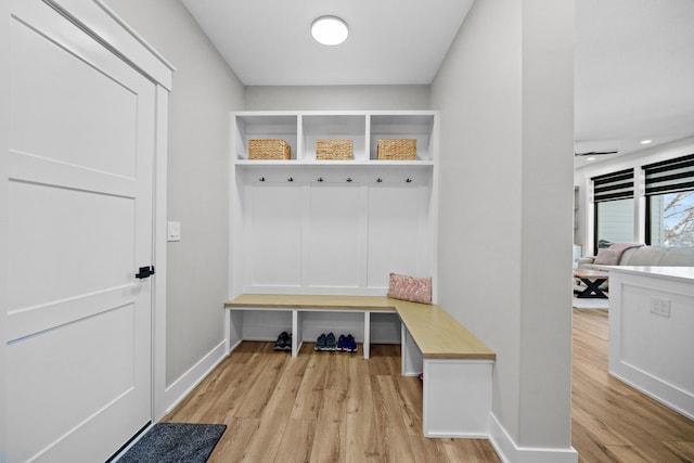 mudroom with light hardwood / wood-style floors