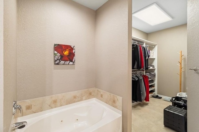 bathroom with a tub