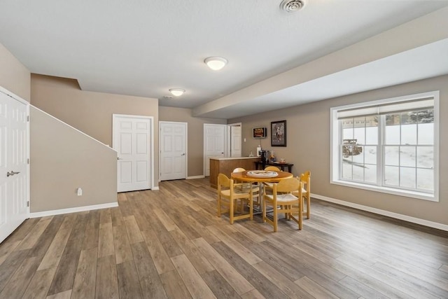 dining room featuring light hardwood / wood-style flooring