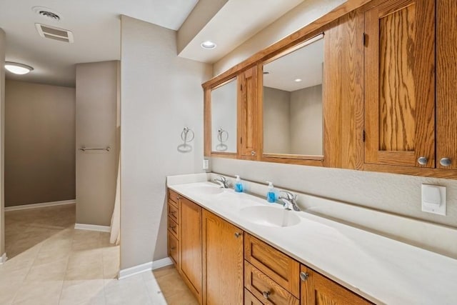 bathroom featuring vanity and tile patterned floors