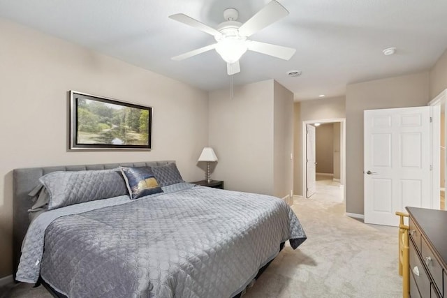 bedroom with light colored carpet and ceiling fan