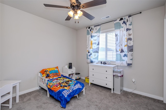 bedroom with light colored carpet and ceiling fan