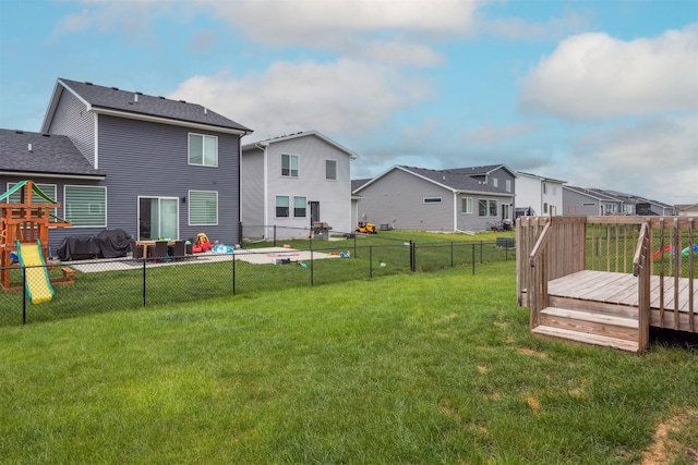 610 NE Whitetail Dr, Ankeny, IA 50021 - view of yard featuring a wooden deck and a residential view