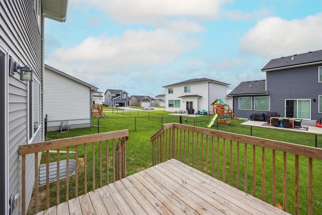 610 NE Whitetail Dr, Ankeny, IA 50021 - deck with a residential view, a playground, and a fenced backyard