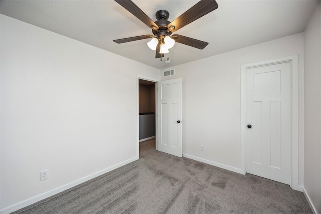 610 NE Whitetail Dr, Ankeny, IA 50021 - unfurnished bedroom featuring carpet floors and a ceiling fan