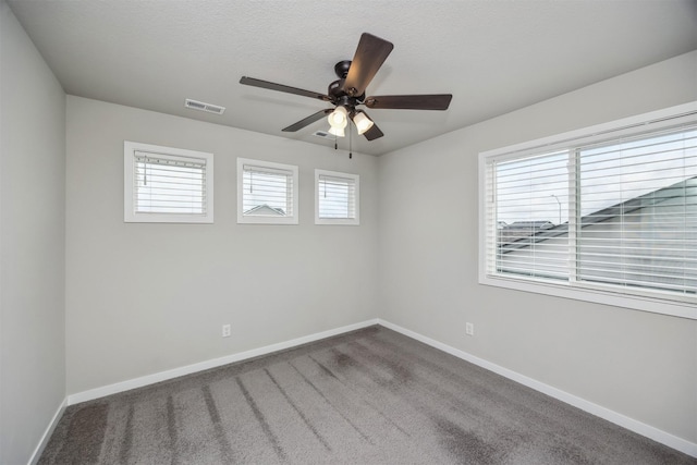 610 NE Whitetail Dr, Ankeny, IA 50021 - carpeted spare room with a ceiling fan and baseboards