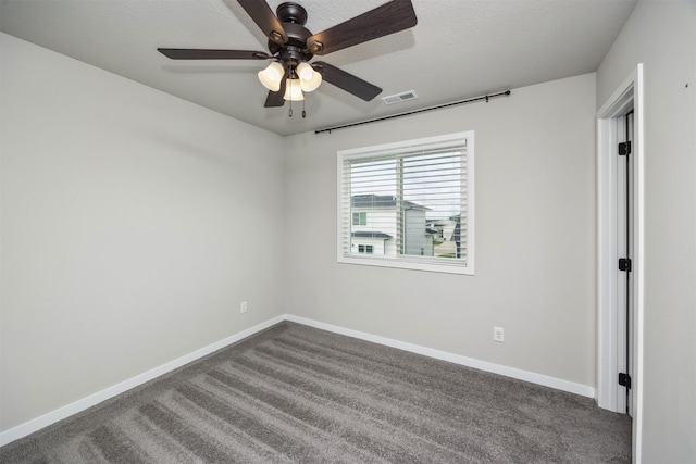 610 NE Whitetail Dr, Ankeny, IA 50021 - empty room with ceiling fan and dark colored carpet