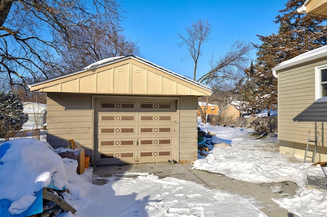 view of snow covered garage