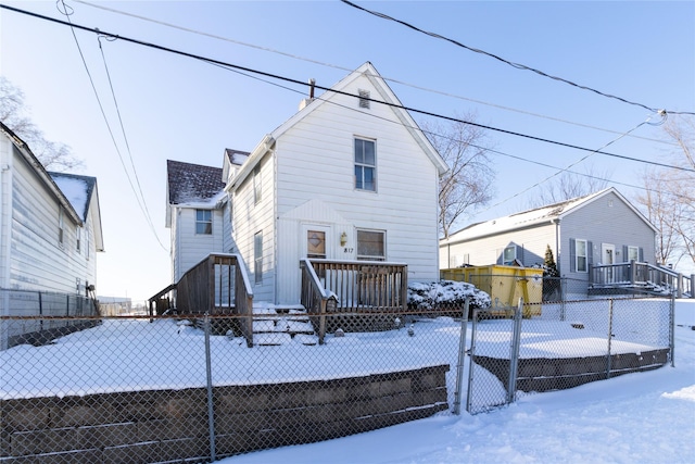 view of snow covered property