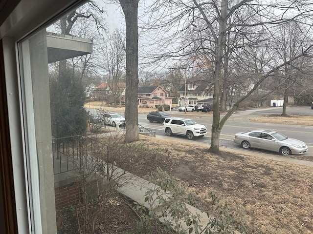 view of yard featuring a residential view