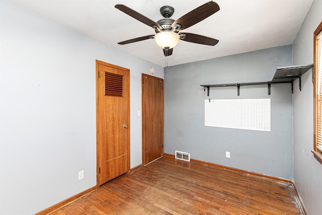 unfurnished bedroom featuring ceiling fan and light wood-type flooring