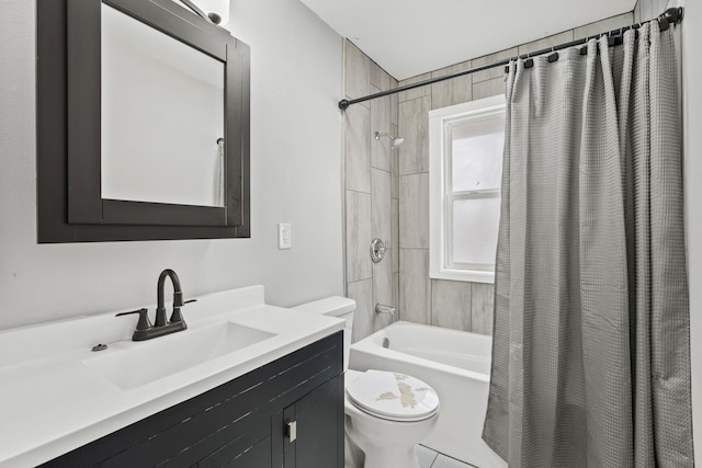 full bathroom featuring vanity, shower / tub combo, and toilet