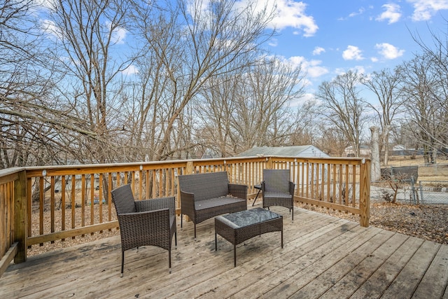 wooden terrace featuring outdoor lounge area