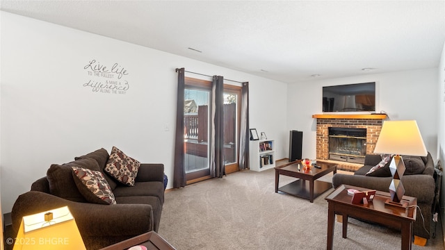 living room featuring light carpet and a brick fireplace