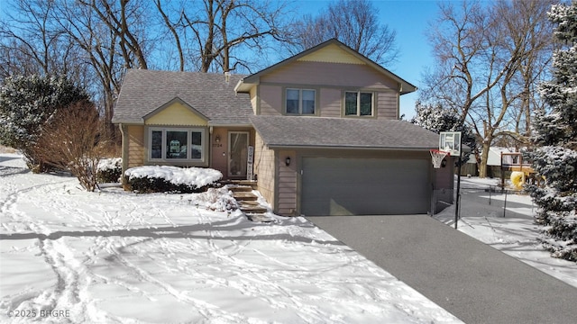 split level home with a garage