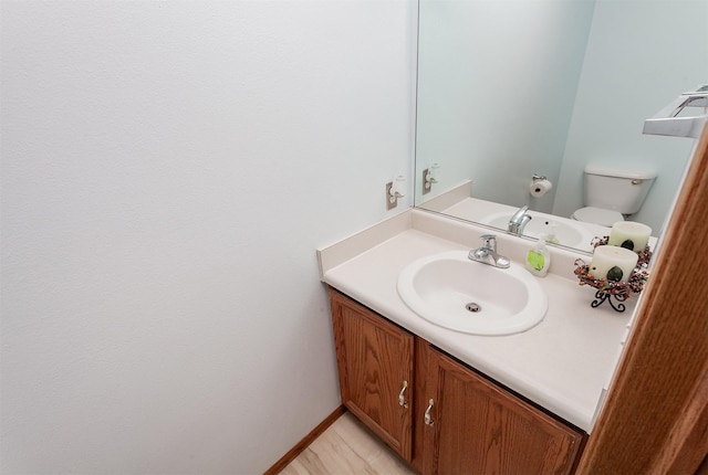 3015 Deerpath Ct, Des Moines, IA 50320 - bathroom featuring vanity and toilet