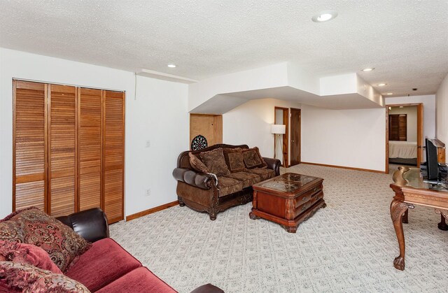 3015 Deerpath Ct, Des Moines, IA 50320 - living area with carpet, a textured ceiling, and recessed lighting