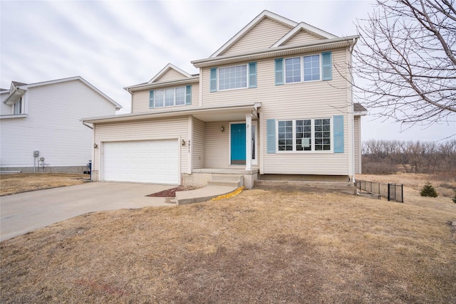 traditional-style house featuring concrete driveway, an attached garage, and fence