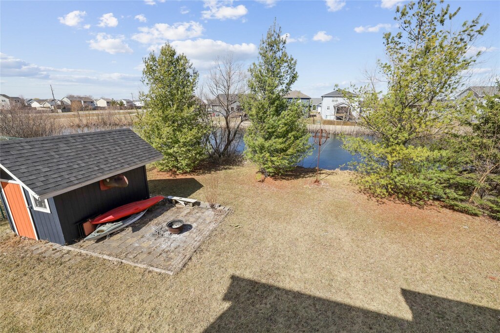 102 5th St NE, Bondurant, IA 50035 - birds eye view of property featuring a residential view