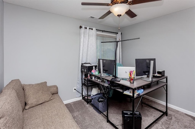 office area with carpet floors and ceiling fan