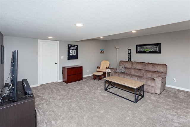 living room featuring light carpet and a textured ceiling