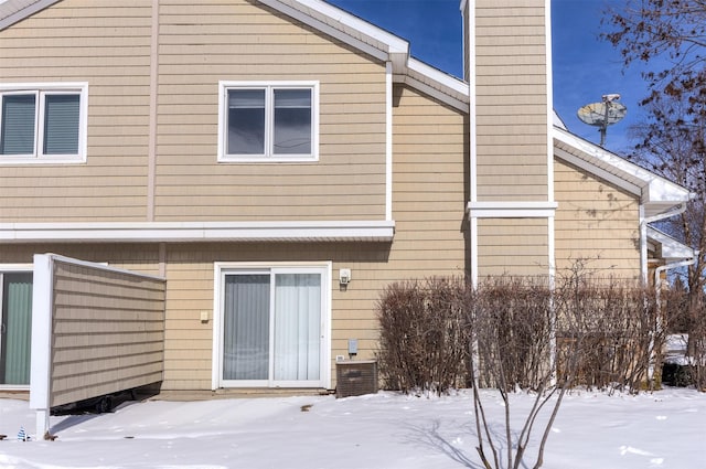 view of snow covered house