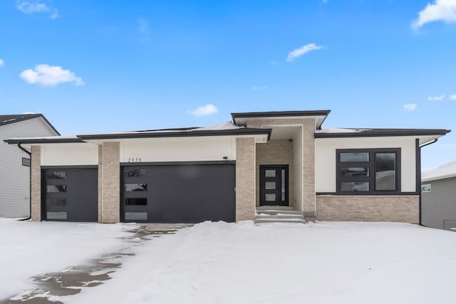 prairie-style home with a garage