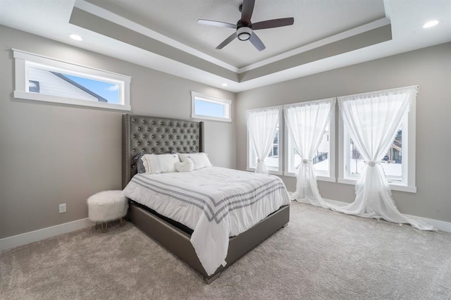 2938 NE Brentwood Cir, Grimes, IA 50111 - carpeted bedroom with a tray ceiling, recessed lighting, and ceiling fan