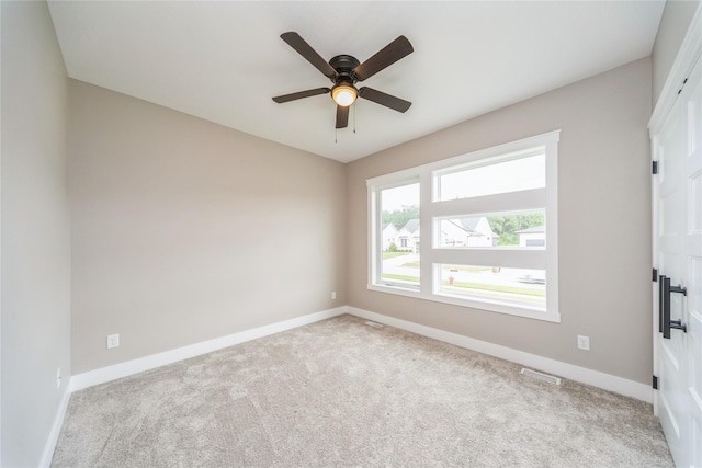 2938 NE Brentwood Cir, Grimes, IA 50111 - unfurnished room featuring carpet floors and a ceiling fan