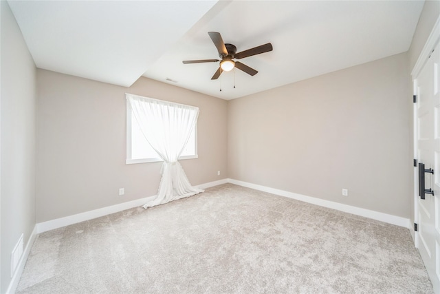 2938 NE Brentwood Cir, Grimes, IA 50111 - carpeted spare room with ceiling fan and baseboards