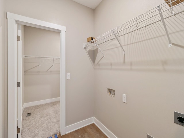 laundry area featuring hookup for a washing machine, carpet, and electric dryer hookup