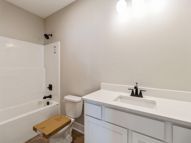 full bathroom with vanity, shower / washtub combination, and toilet