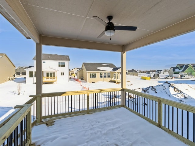 snow covered deck with ceiling fan