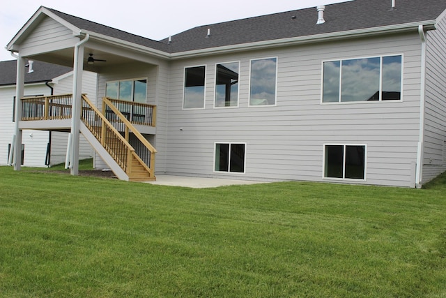 4651 180th St, Urbandale, IA 50323 - rear view of house with a lawn, a patio, ceiling fan, and stairs
