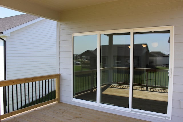 4651 180th St, Urbandale, IA 50323 - view of wooden balcony featuring a deck
