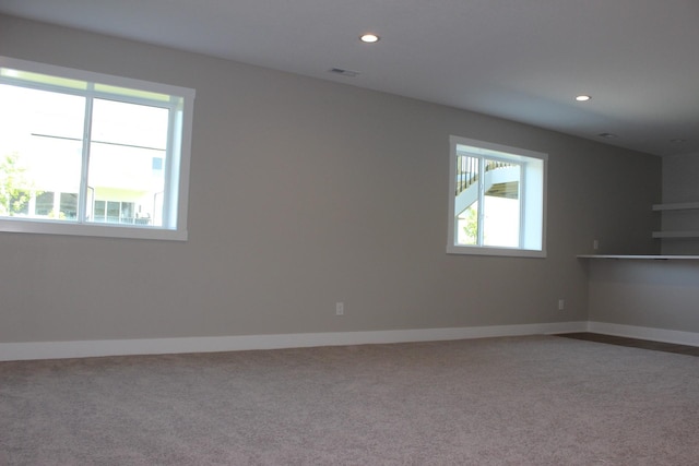 4651 180th St, Urbandale, IA 50323 - carpeted spare room featuring recessed lighting