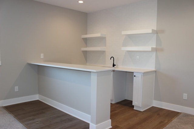 4651 180th St, Urbandale, IA 50323 - bar featuring dark wood-style flooring and recessed lighting