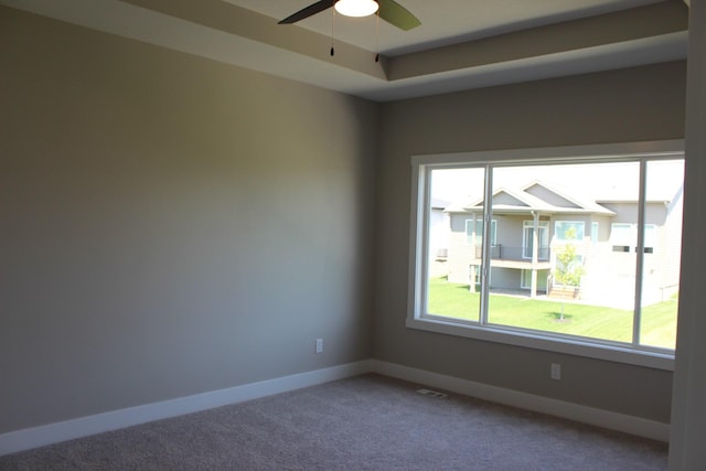 4651 180th St, Urbandale, IA 50323 - carpeted spare room with baseboards and ceiling fan