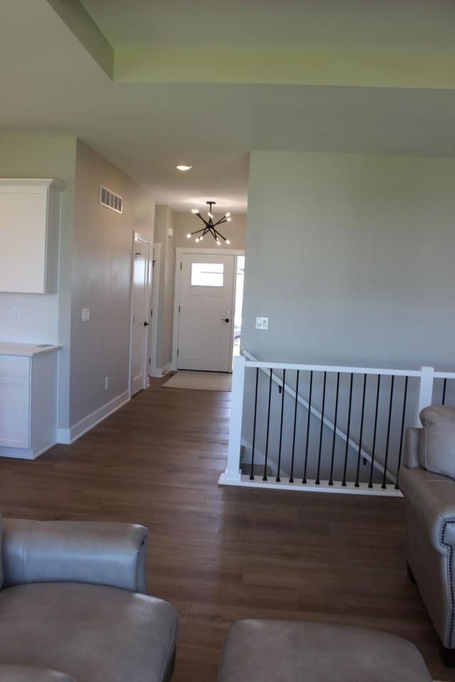 4651 180th St, Urbandale, IA 50323 - living room featuring wood finished floors, a chandelier, and recessed lighting