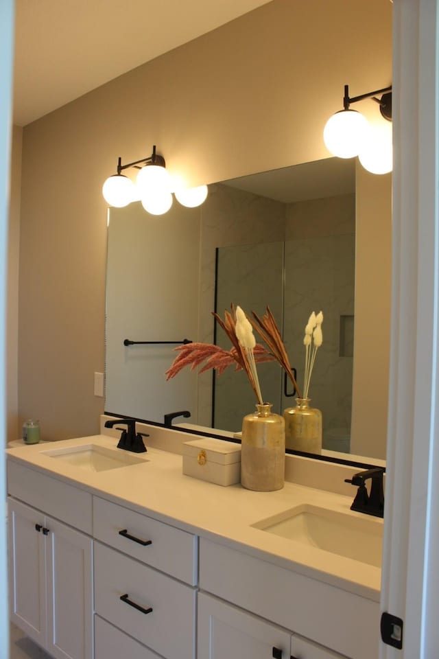 4651 180th St, Urbandale, IA 50323 - full bathroom with double vanity and walk in shower